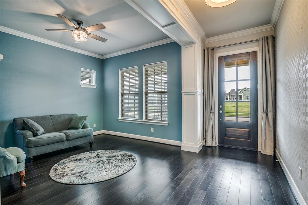 8917 Homestead Boulevard Rowlett, TX 75089 - Photo 2 of 40 a living room with furniture and a large window