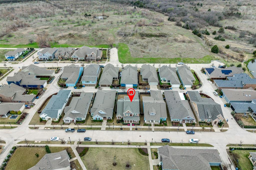 8917 Homestead Boulevard Rowlett, TX 75089 - Photo 40 of 40 an aerial view of residential houses with outdoor space