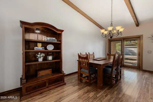 a large bathroom with a large tub and sink