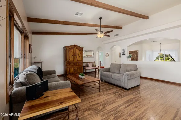 a bedroom with a bed and a night stand