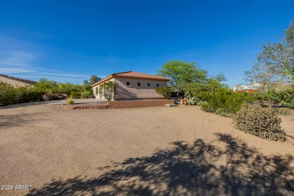 a kitchen with stainless steel appliances granite countertop a sink and a cabinets