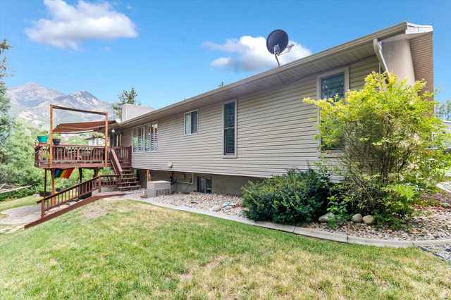 2863 Fallentine Road Sandy, UT 84093 - Photo 46 of 48 Multi-level wood deck with a partial shade structure