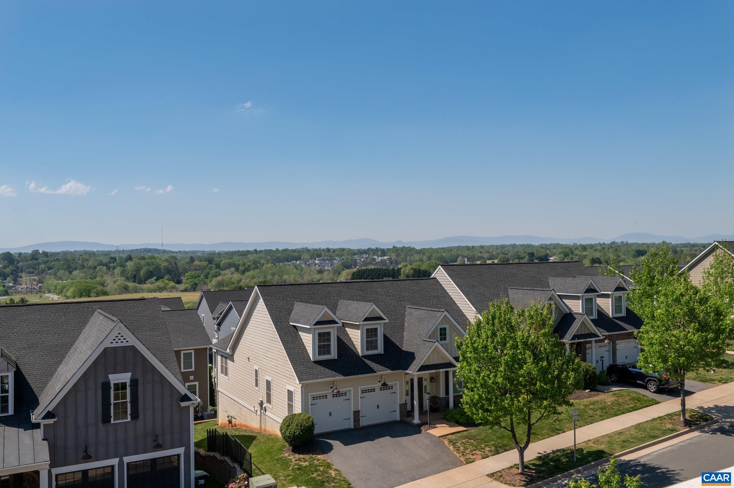1411 Terrace Lane Charlottesville, VA 22911 - Photo 13 of 72 an aerial view of a house with a yard and mountain view