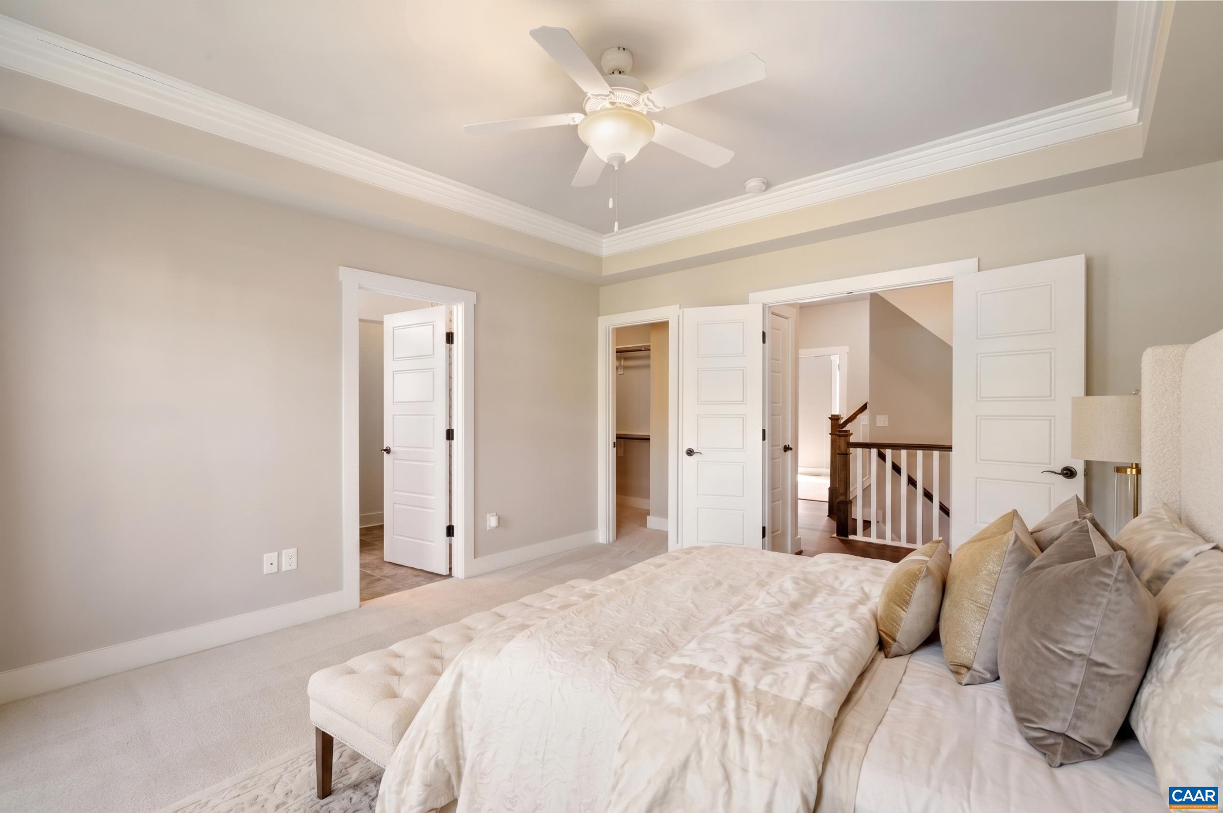 1411 Terrace Lane Charlottesville, VA 22911 - Photo 39 of 72 a bedroom with a large bed and a chandelier