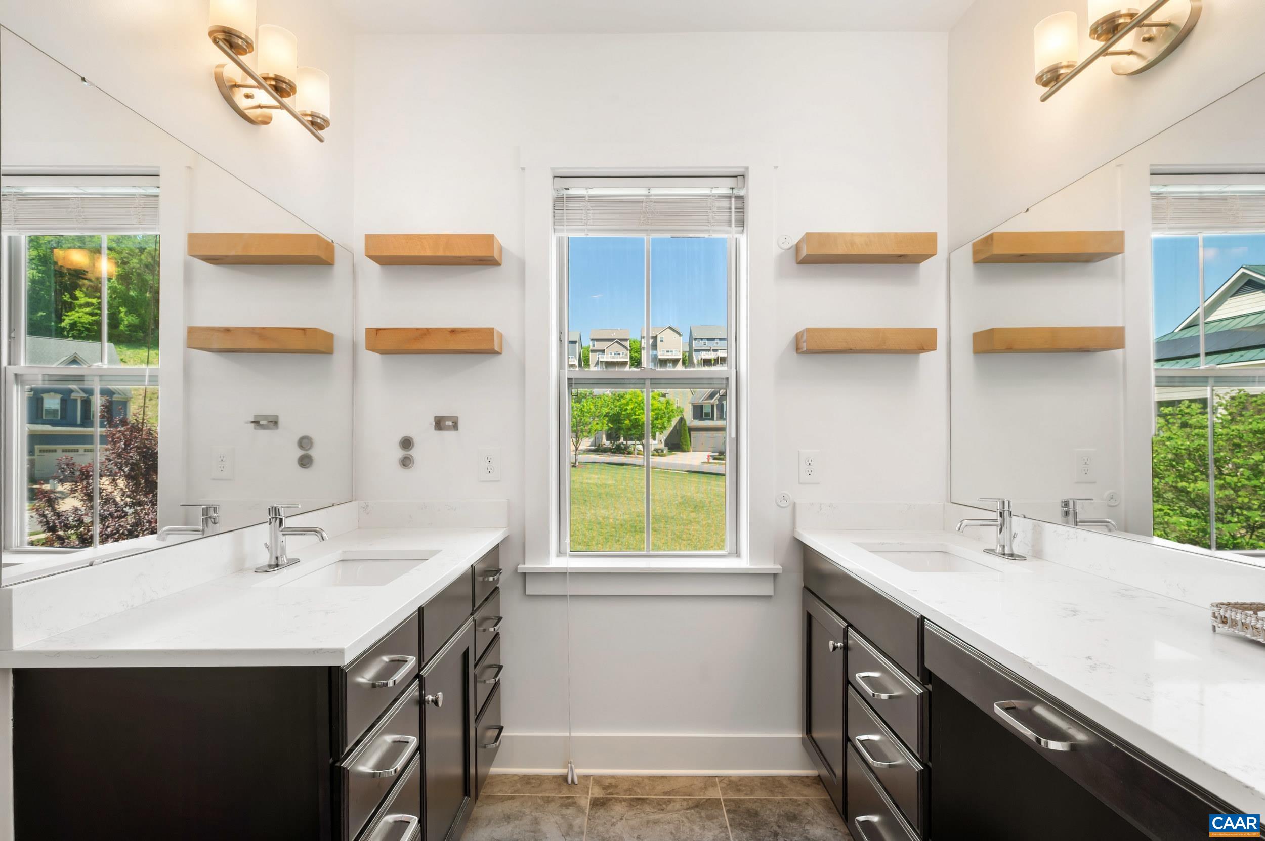 1411 Terrace Lane Charlottesville, VA 22911 - Photo 42 of 72 a bathroom with a sink and a window