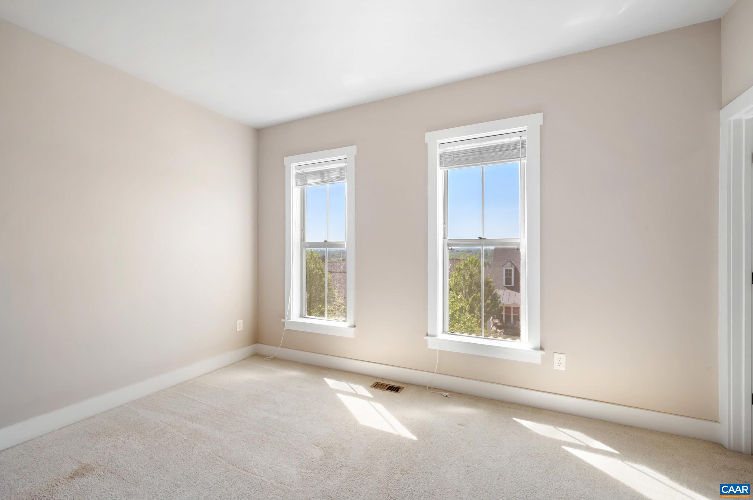 1411 Terrace Lane Charlottesville, VA 22911 - Photo 44 of 72 an empty room with a window