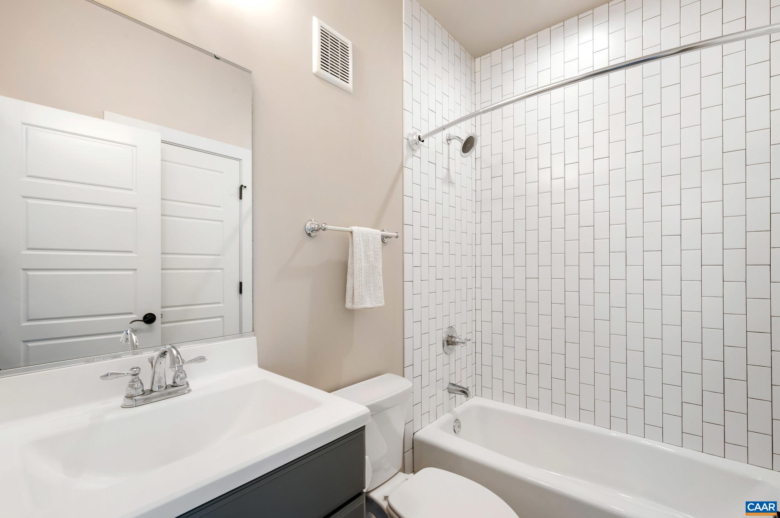 1411 Terrace Lane Charlottesville, VA 22911 - Photo 47 of 72 a bathroom with a sink toilet and shower