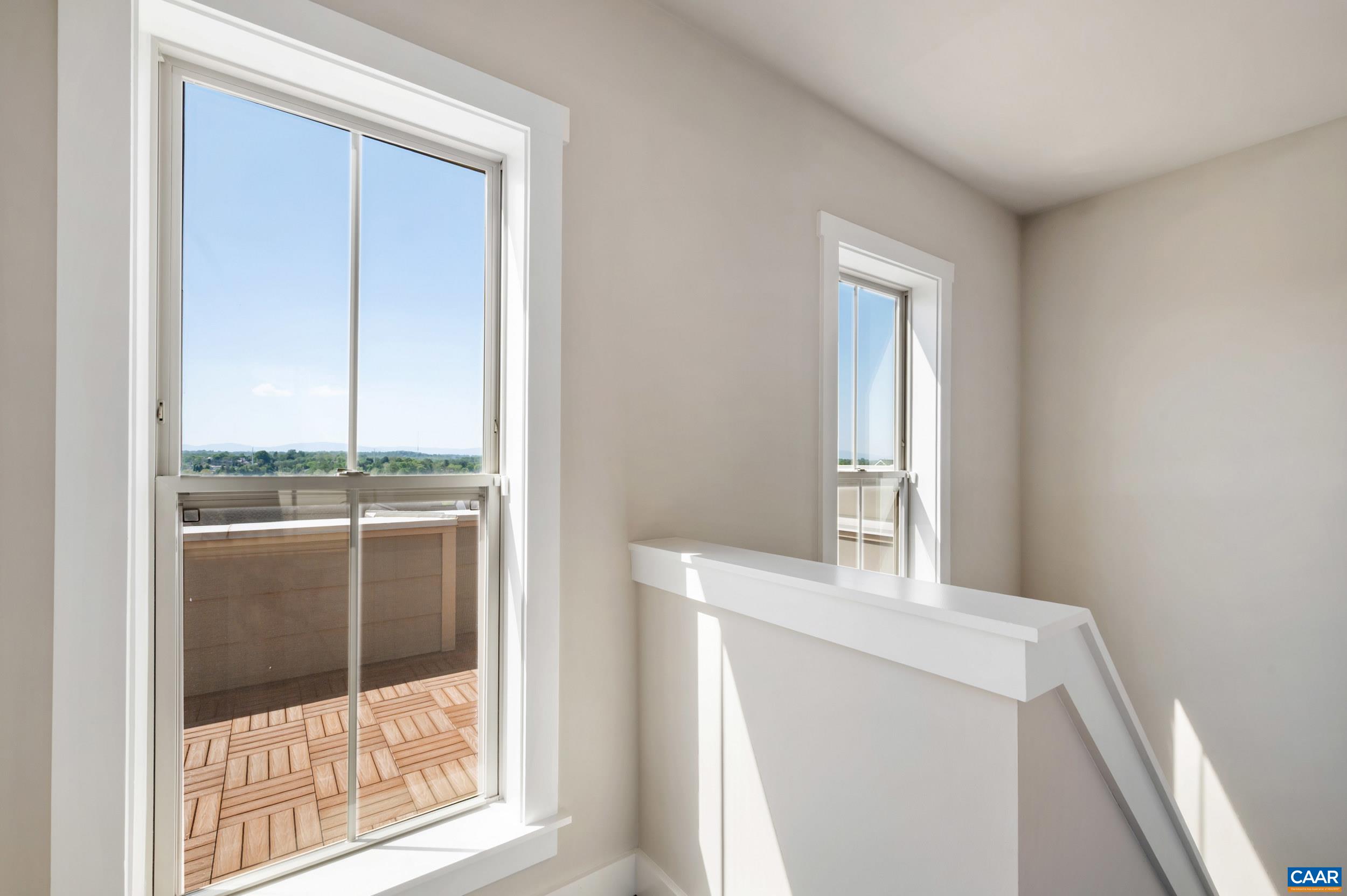 1411 Terrace Lane Charlottesville, VA 22911 - Photo 48 of 72 a view of a small space with wooden floor and a bathroom