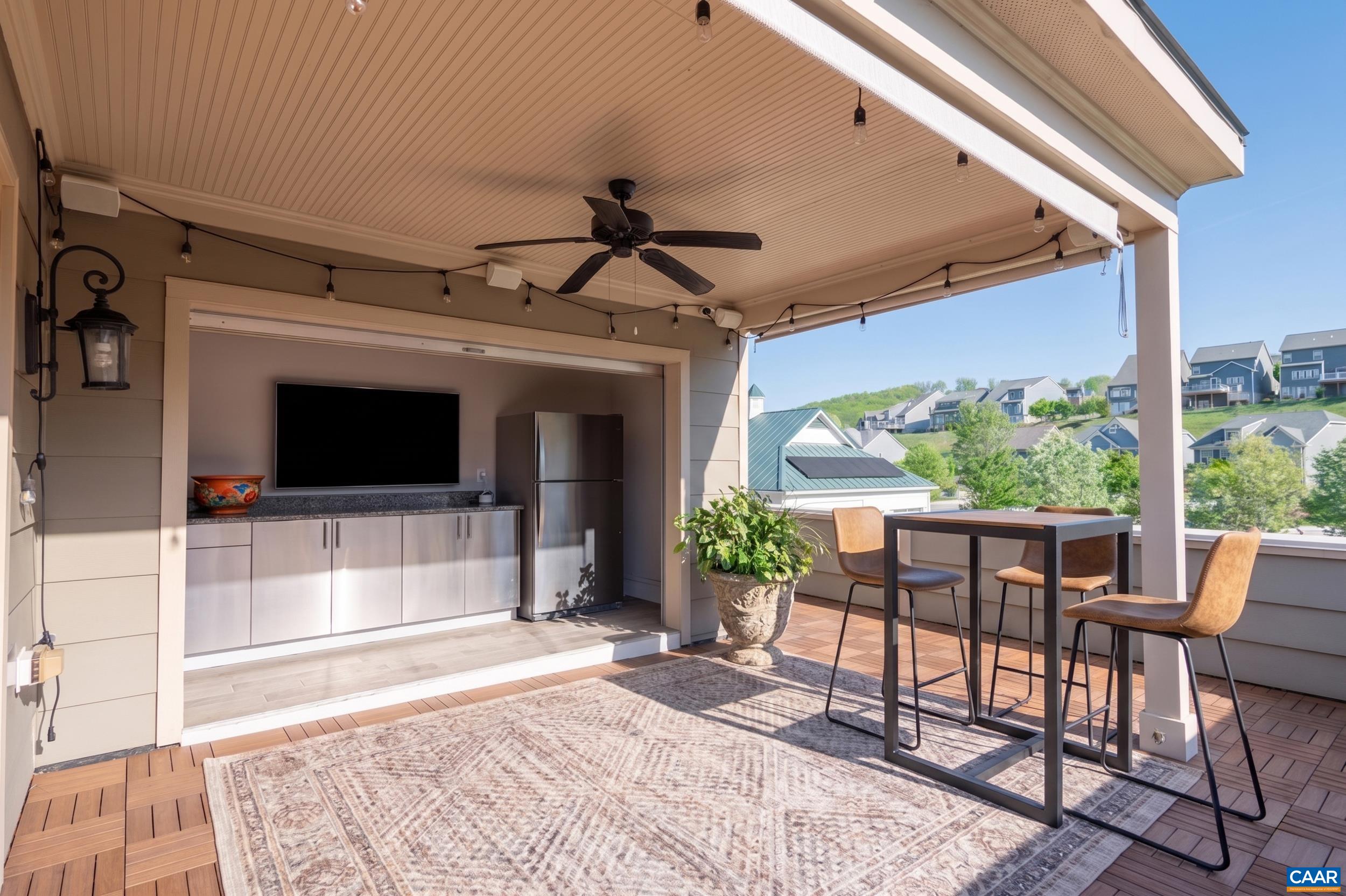 1411 Terrace Lane Charlottesville, VA 22911 - Photo 6 of 72 a view of a porch with furniture and a yard