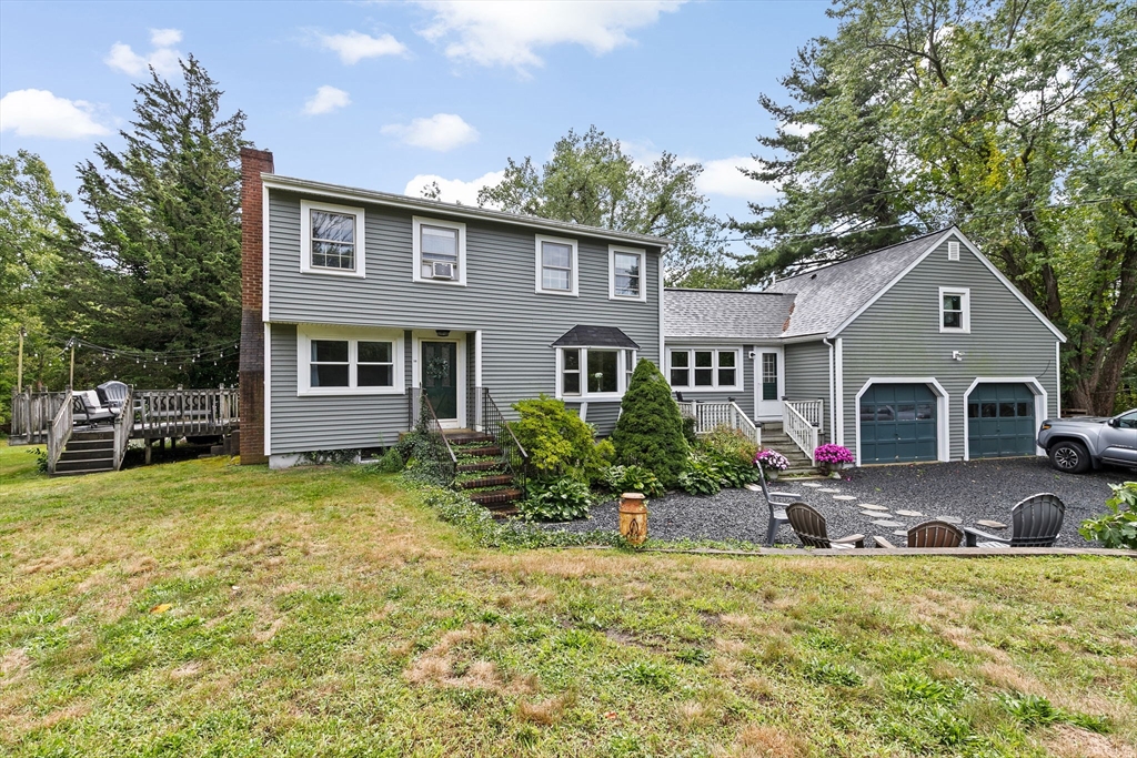 59 Captain Peirce Road Scituate, MA 02066 - Photo 1 of 30 a front view of a house with garden