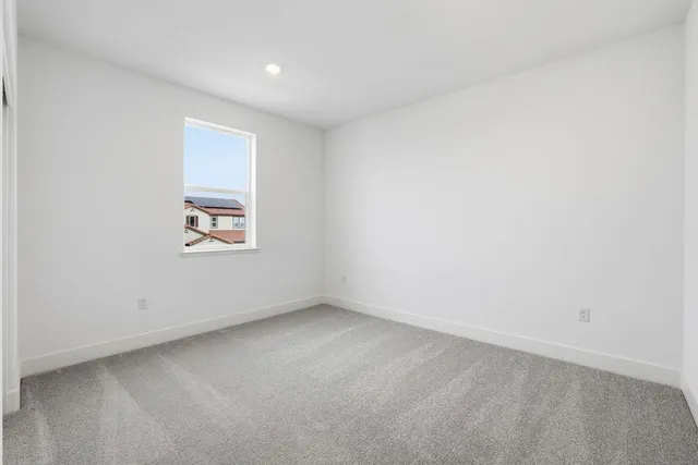 a bathroom with a shower and a sink