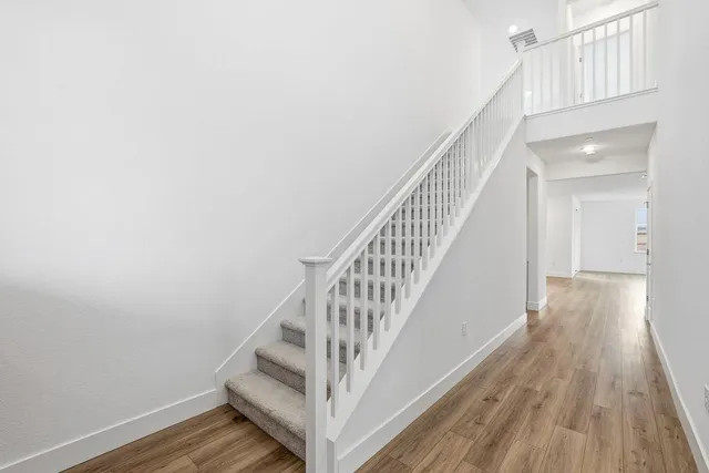 a view of entryway with wooden floor