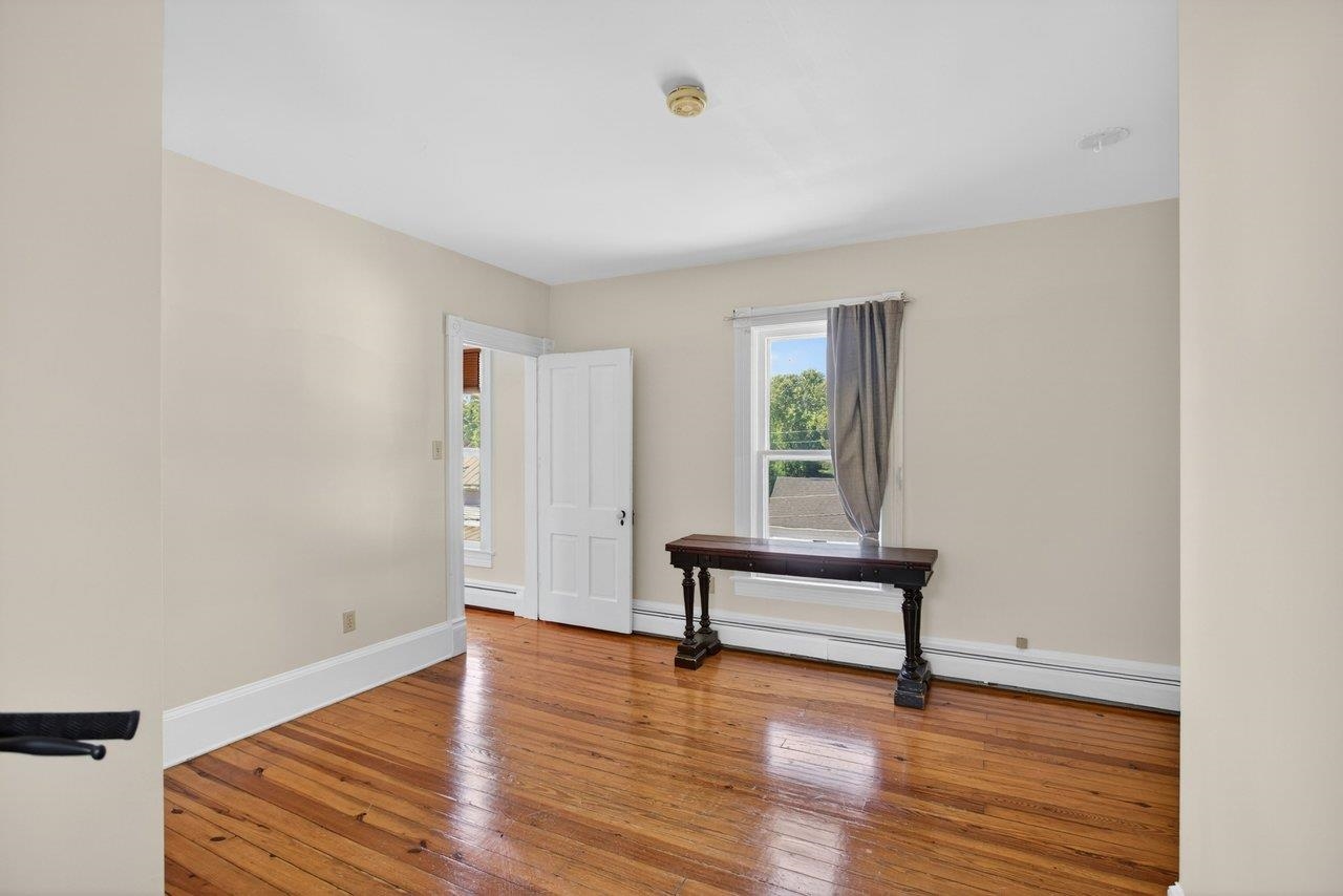 420 West Spring Street Woodstock, VA 22664 - Photo 33 of 67 a view of a room with wooden floor and lounge chairs