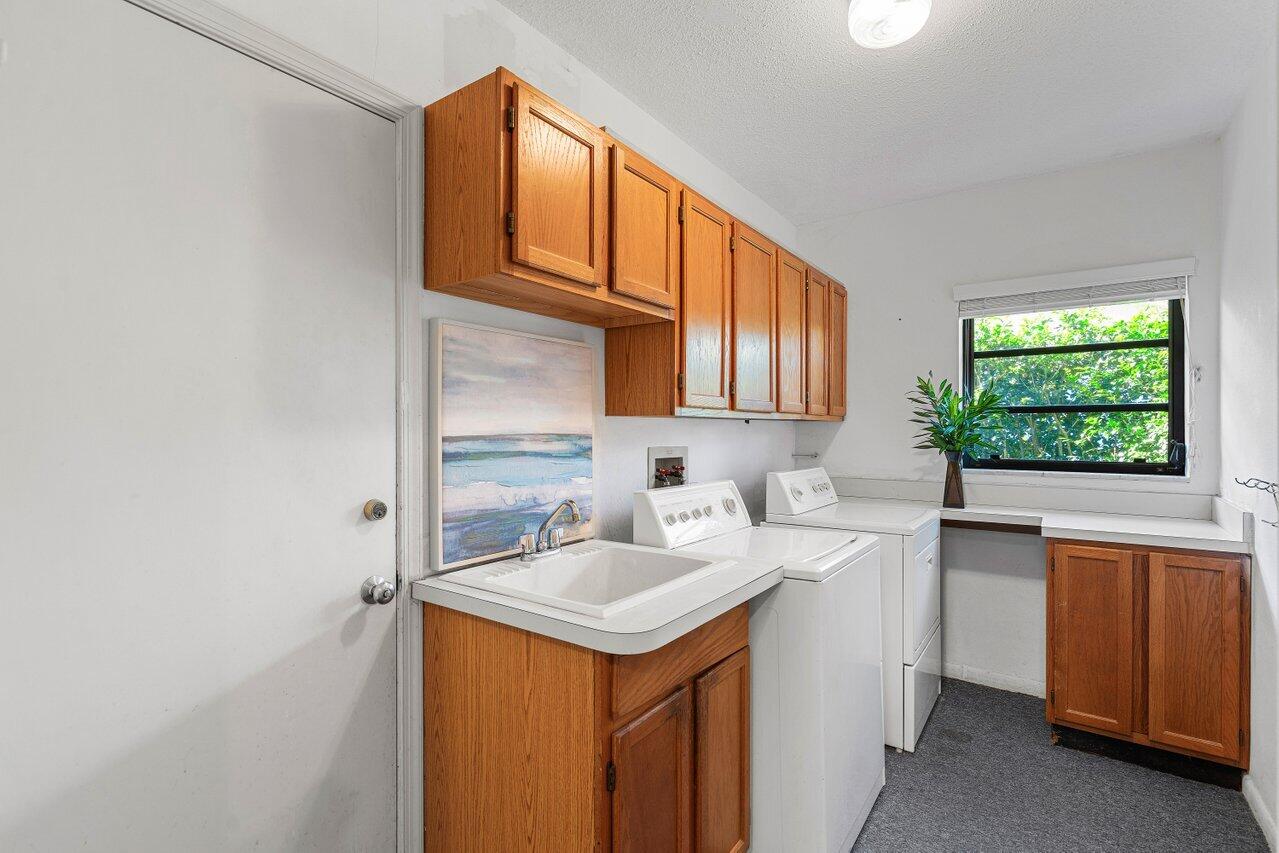 755 Sevilla Drive Boca Raton, FL 33432 - Photo 15 of 16 Laundry room connecting to garage