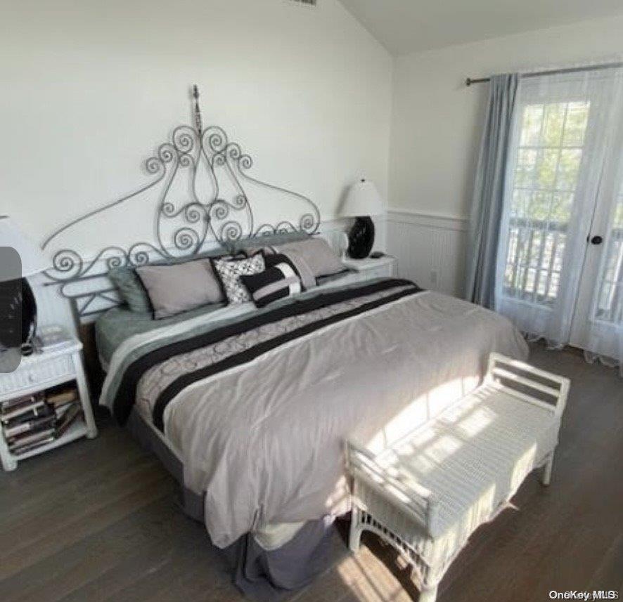 340 Surf Road Ocean Beach, NY 11770 - Photo 2 of 5 a bedroom with a bed and a window