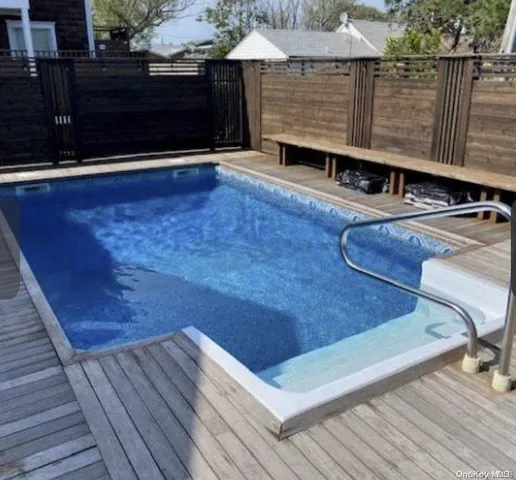 a view of a terrace with wooden floor
