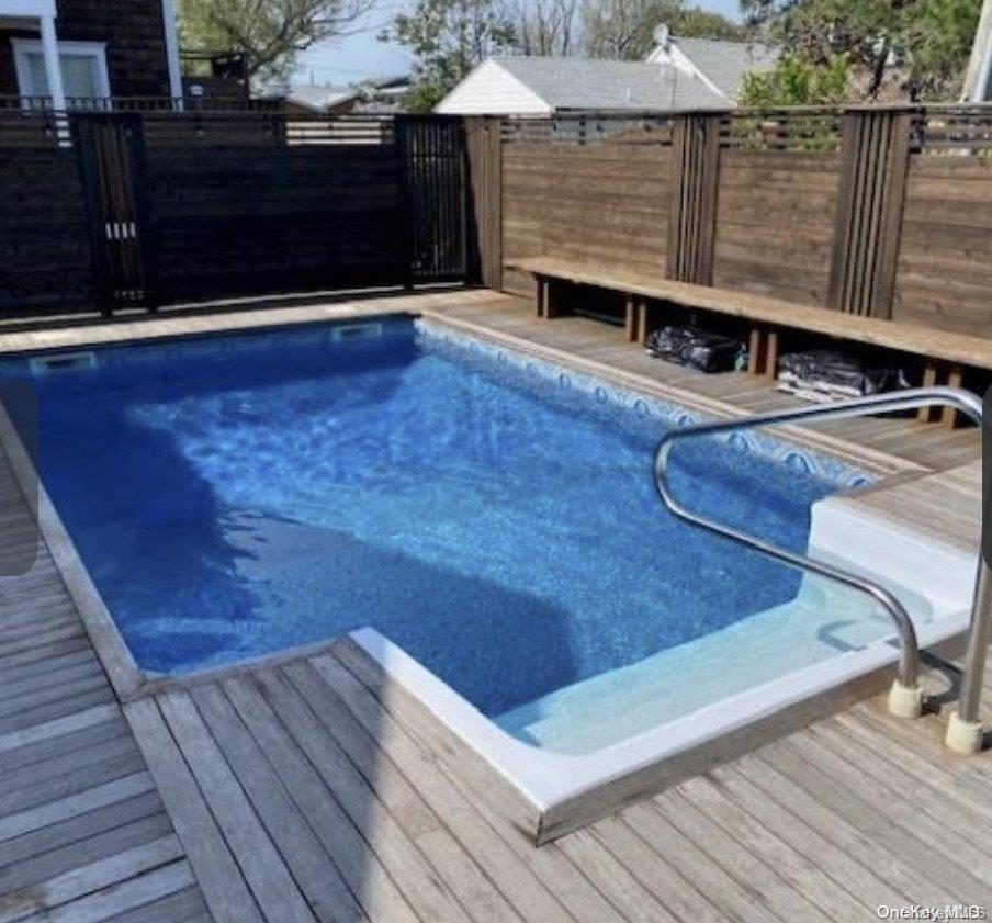 340 Surf Road Ocean Beach, NY 11770 - Photo 5 of 5 a view of a terrace with wooden floor
