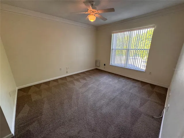 an empty room with a bathroom