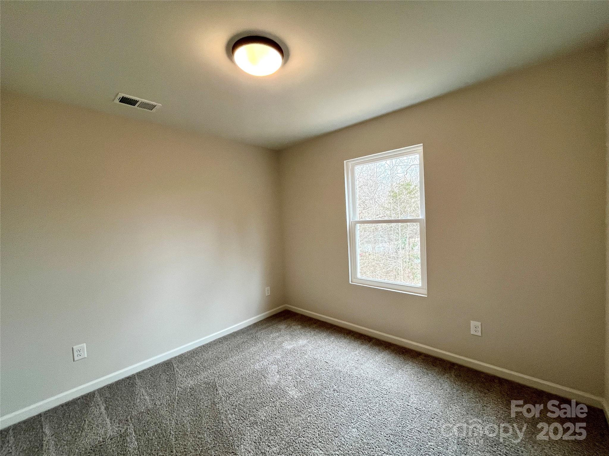 129 Sharon Road York, SC 29745 - Photo 16 of 21 an empty room with a window