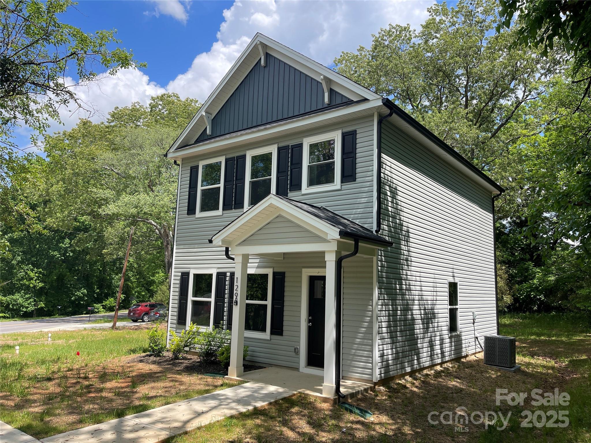 129 Sharon Road York, SC 29745 - Photo 17 of 21 a view of a house with garden and plants