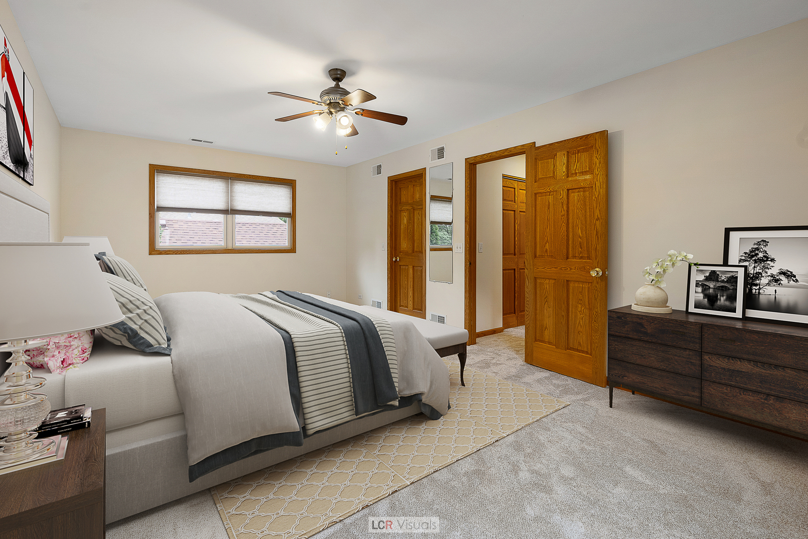 7112 West Belden Avenue Chicago, IL 60707 - Photo 9 of 19 a bedroom with a bed and a chandelier