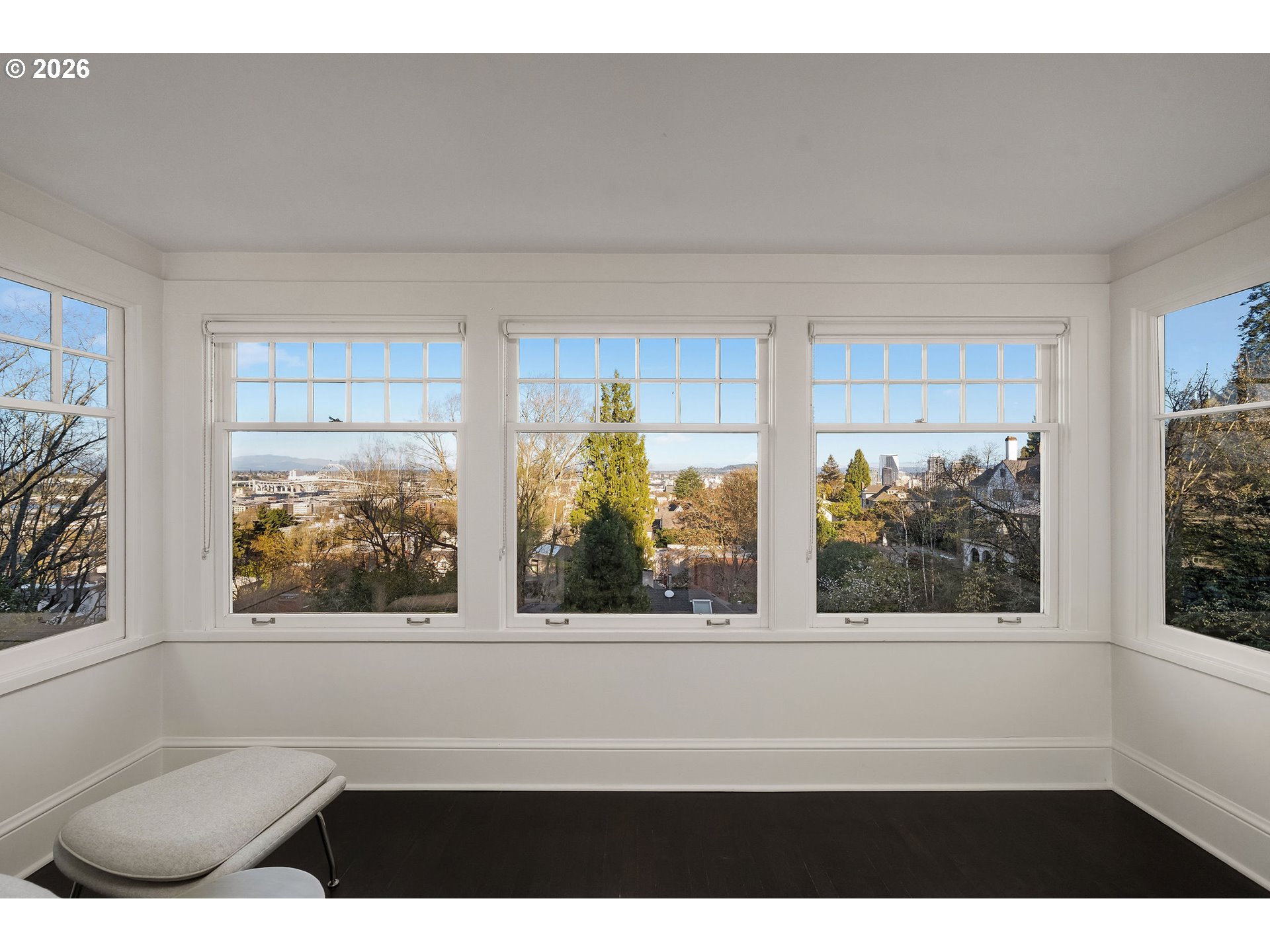 840 Northwest Summit Avenue Portland, OR 97210 - Photo 18 of 48 a living room with furniture and a large window