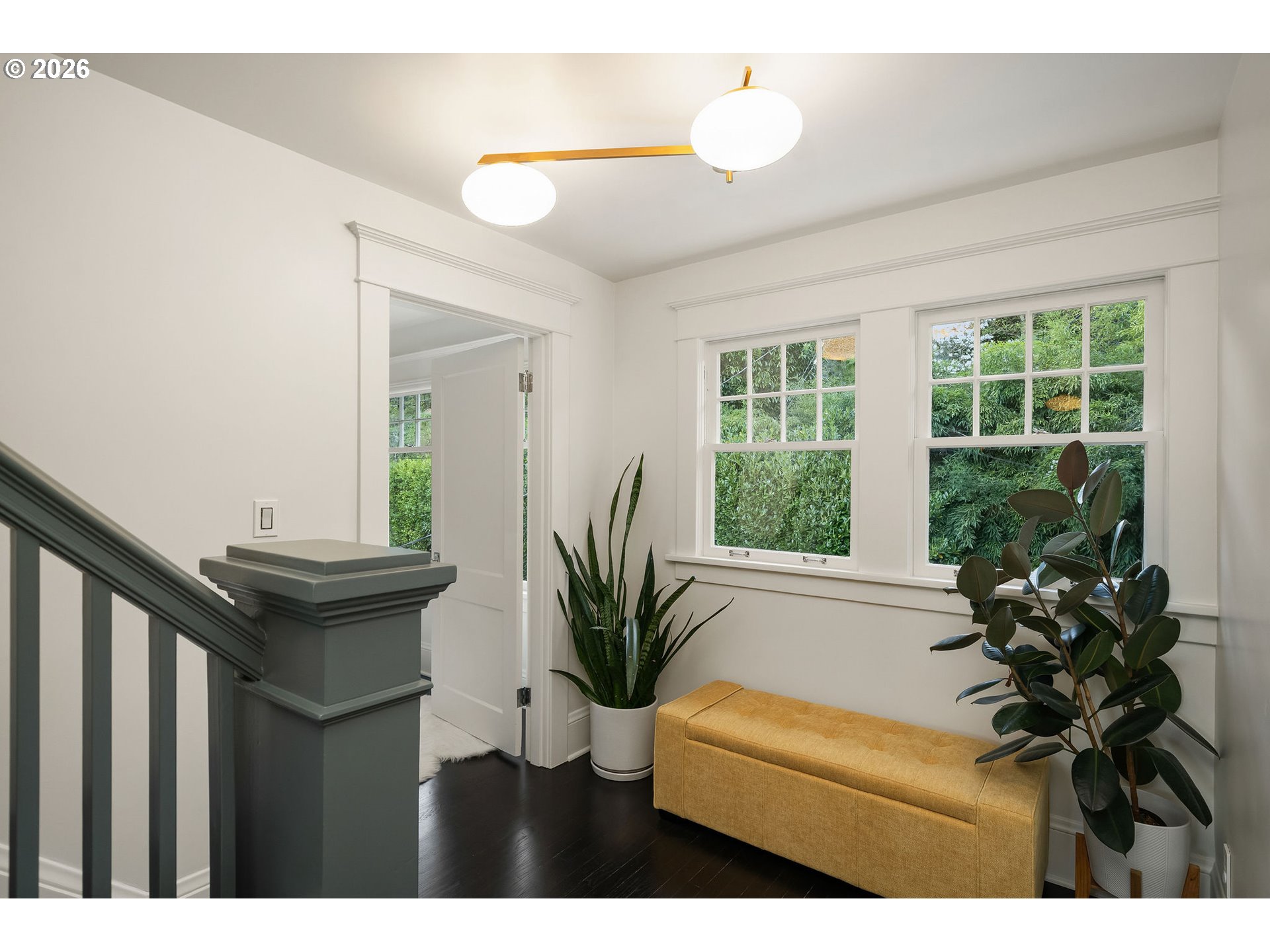 840 Northwest Summit Avenue Portland, OR 97210 - Photo 27 of 48 a view of a living room and a potted plant