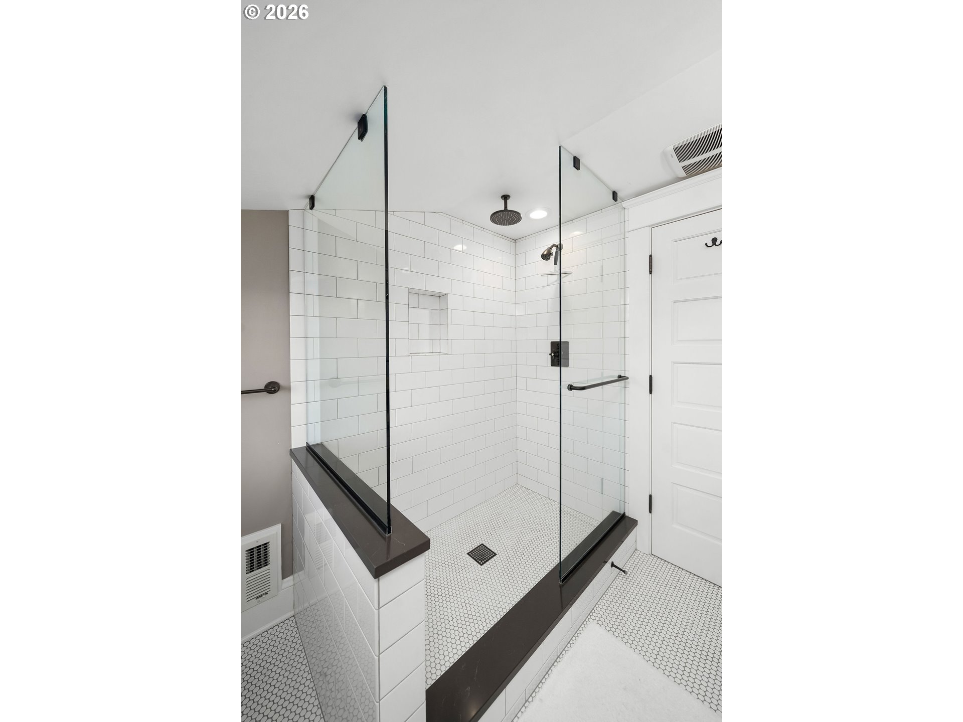 840 Northwest Summit Avenue Portland, OR 97210 - Photo 31 of 48 a bathroom with a shower and a sink