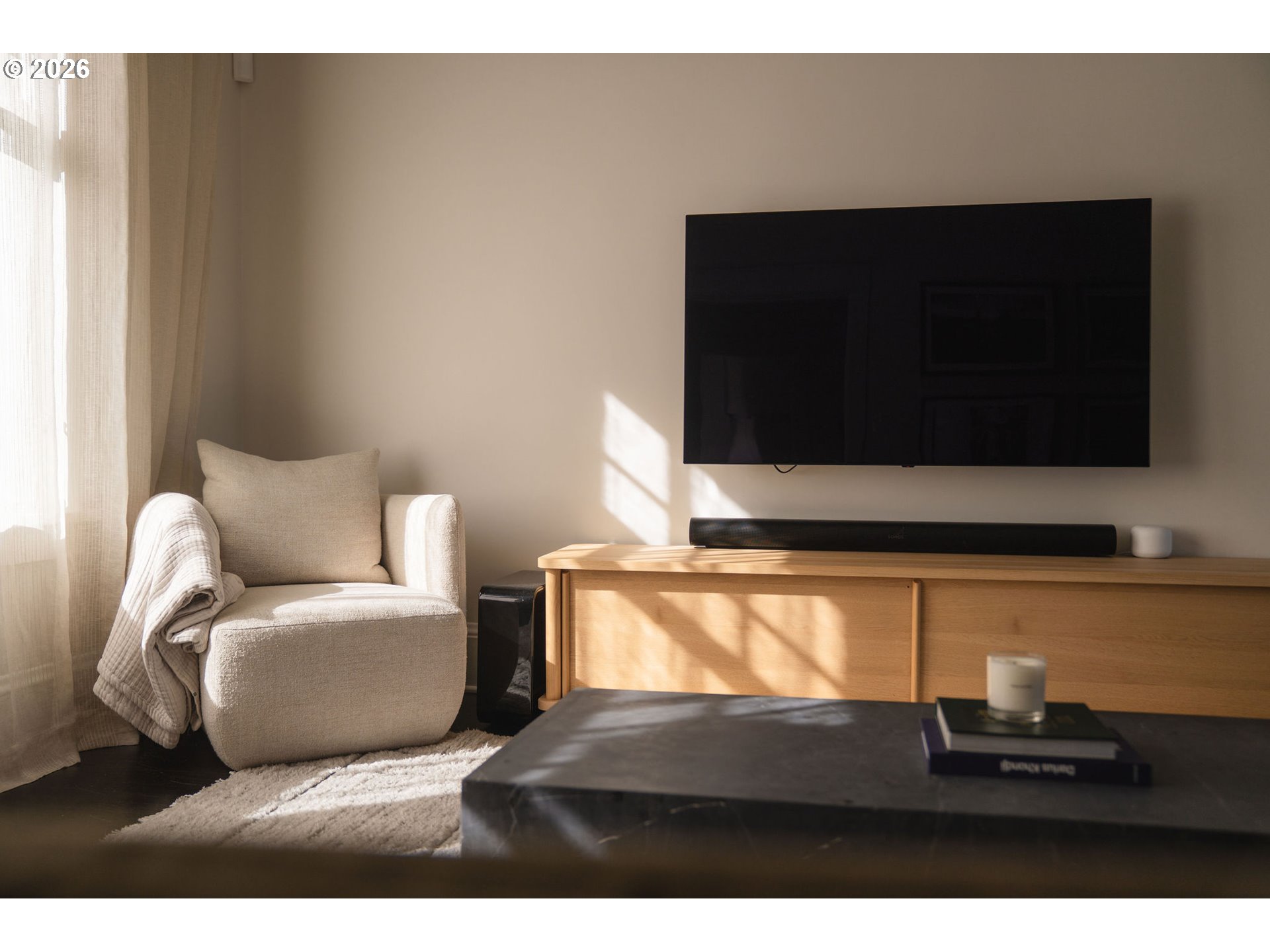 840 Northwest Summit Avenue Portland, OR 97210 - Photo 5 of 48 a living room with furniture and a flat screen tv
