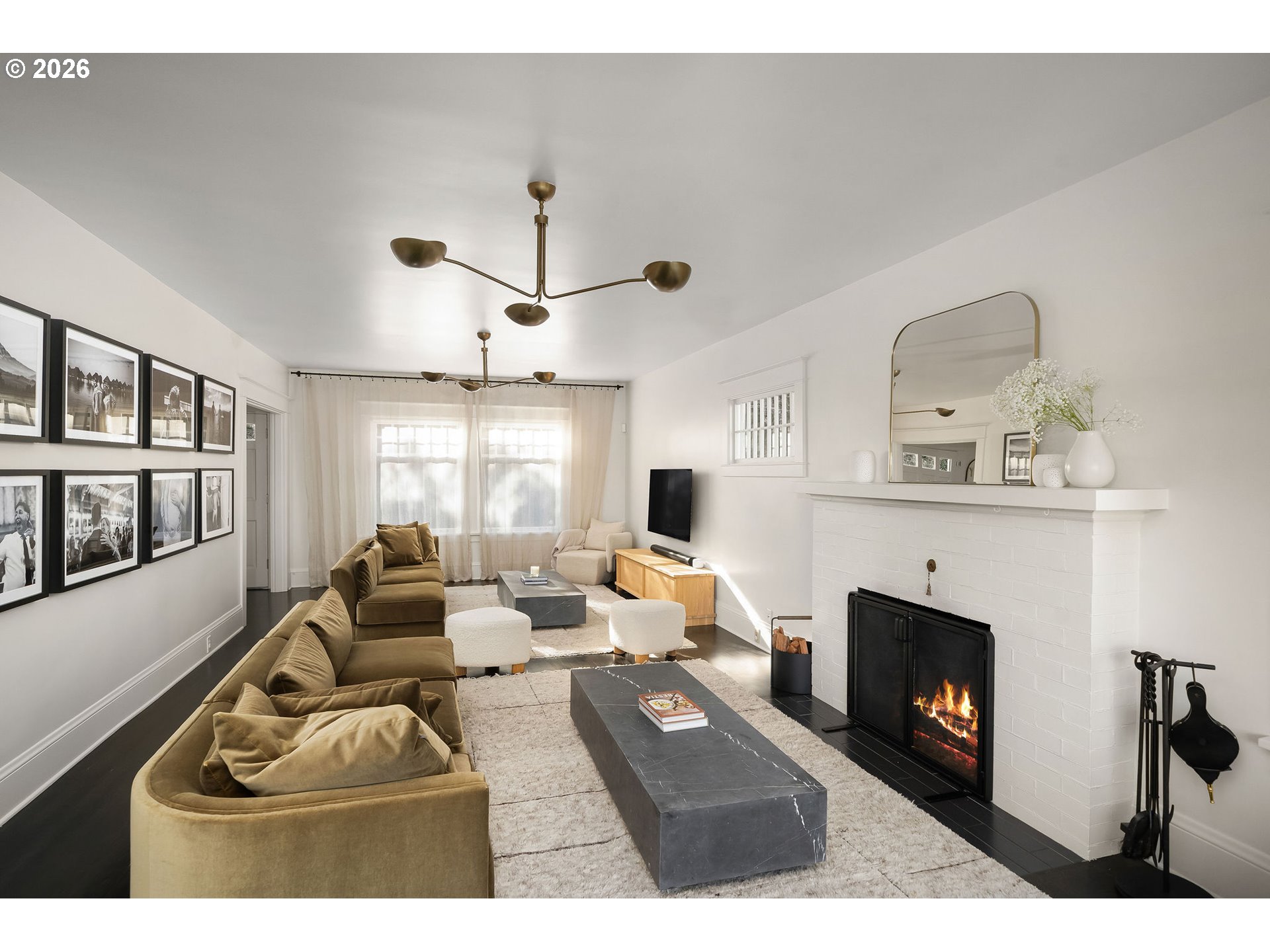 840 Northwest Summit Avenue Portland, OR 97210 - Photo 6 of 48 a living room with furniture a window and a fireplace