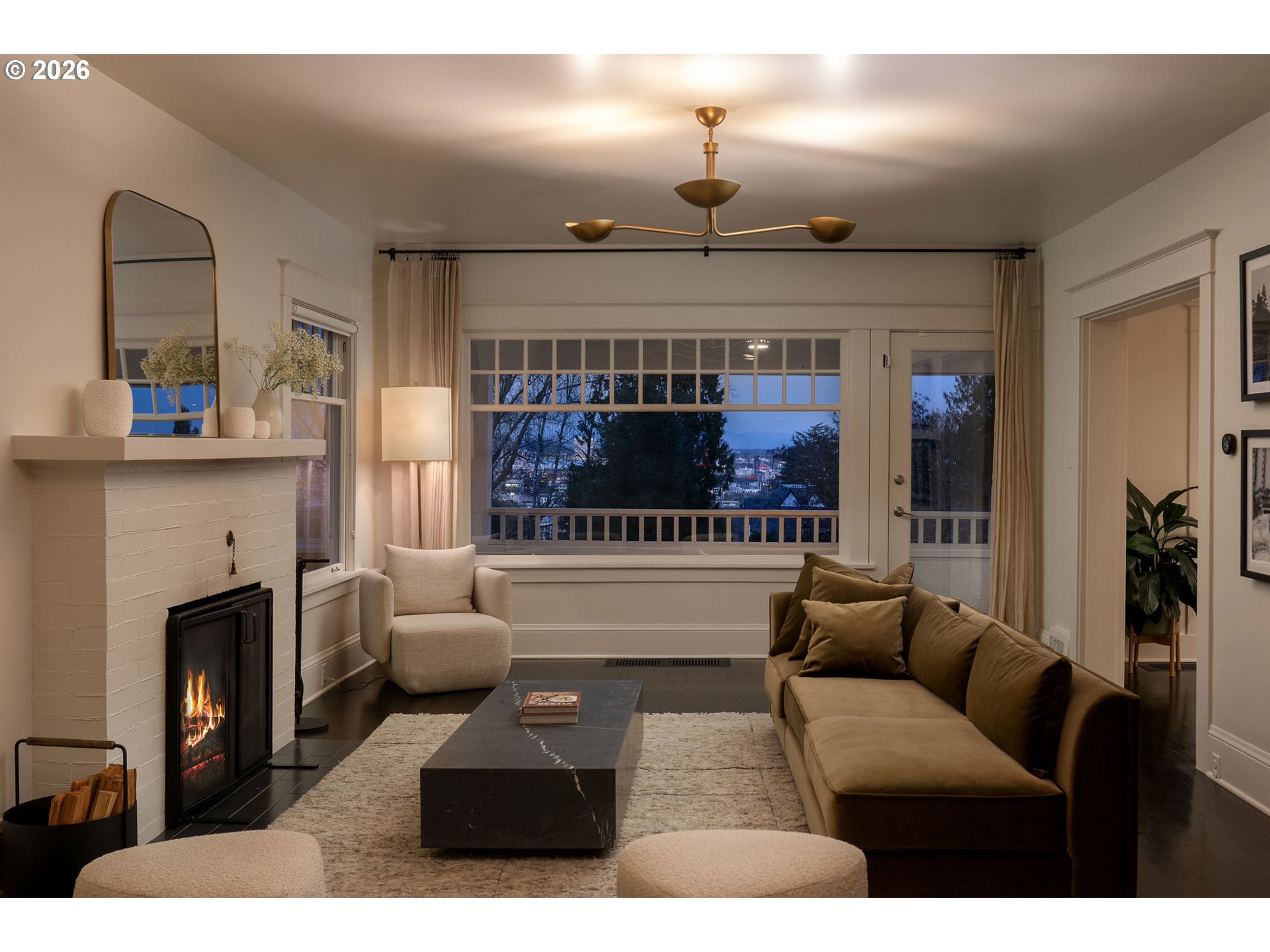 840 Northwest Summit Avenue Portland, OR 97210 - Photo 7 of 48 a living room with furniture and a fireplace