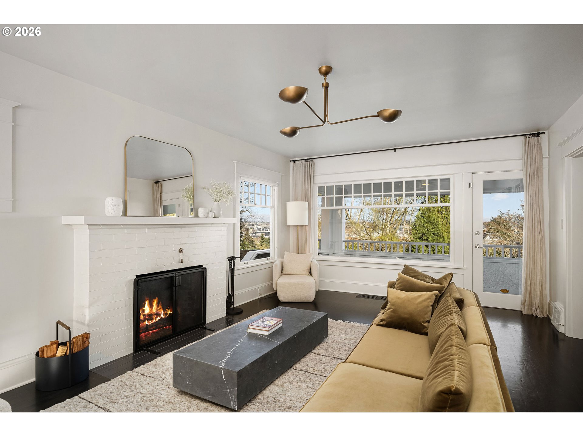 840 Northwest Summit Avenue Portland, OR 97210 - Photo 8 of 48 a living room with furniture and a fireplace
