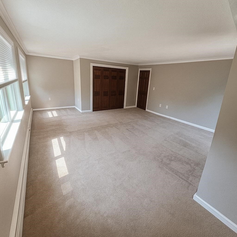 70 Chamberlain Road Westford, MA 01886 - Photo 9 of 25 a view of an empty room with a window