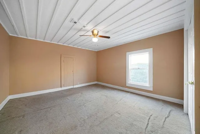 a view of livingroom with hardwood floor and ceiling fan