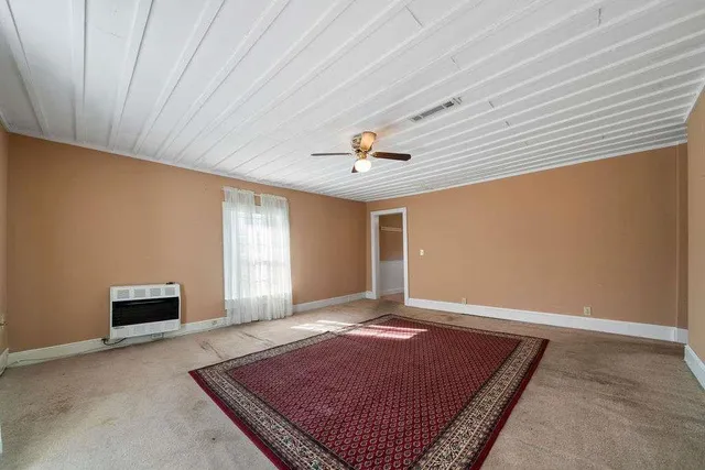 a view of a room with a rug