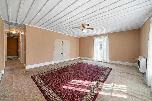 an aerial view of a building with street view