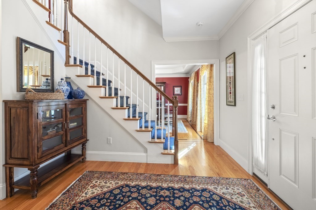 3 Benjamin Road Lexington, MA 02421 - Photo 2 of 42 a view of entryway and hall with wooden floor
