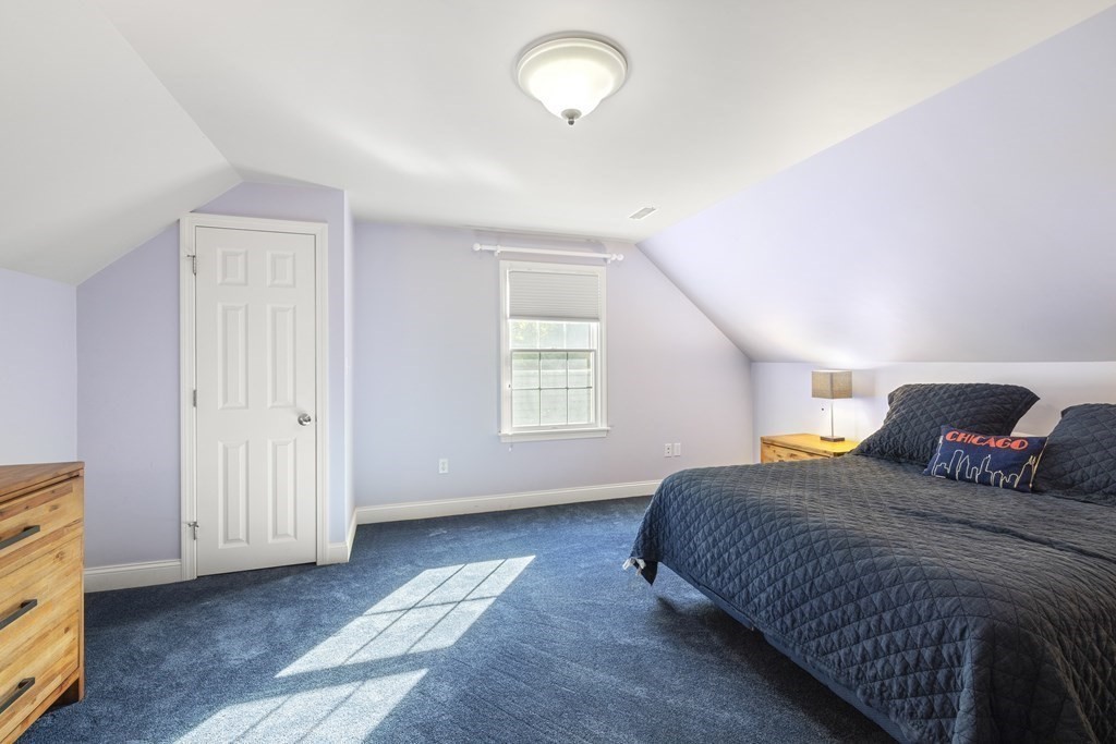 3 Benjamin Road Lexington, MA 02421 - Photo 27 of 42 a bedroom with a bed and a window