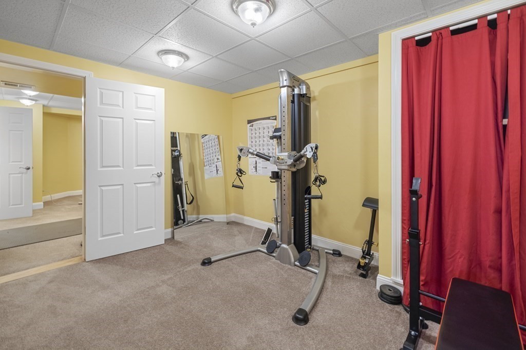 3 Benjamin Road Lexington, MA 02421 - Photo 31 of 42 a view of a bathroom with a tub and shower