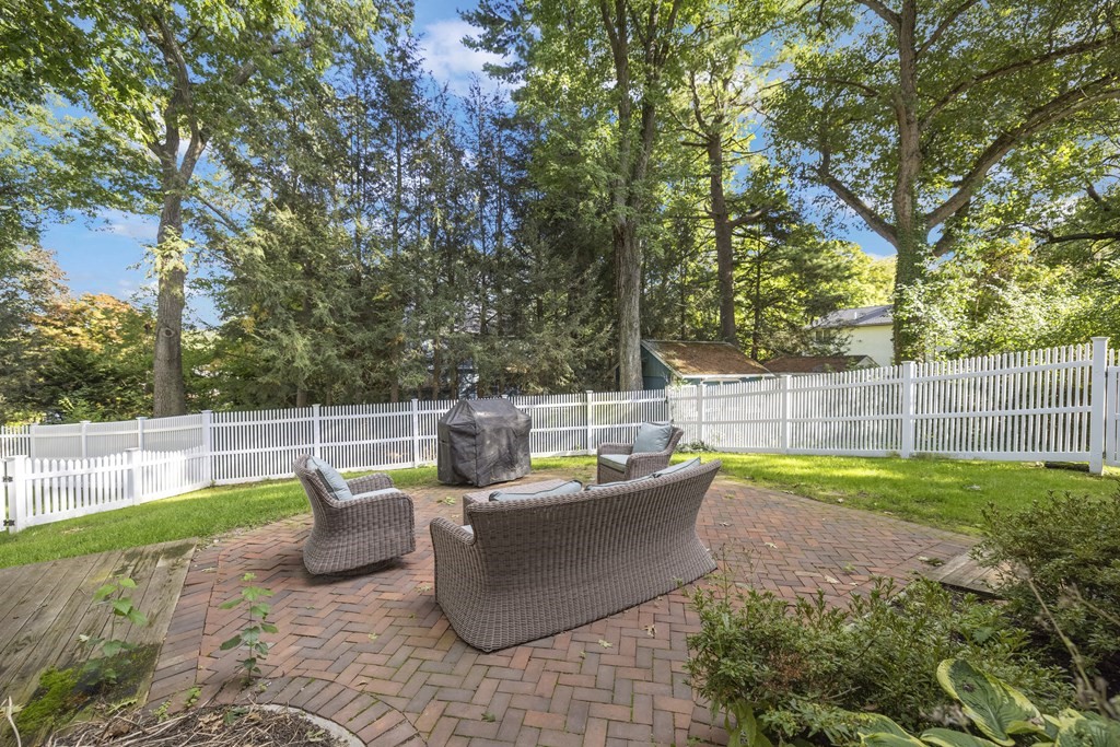 3 Benjamin Road Lexington, MA 02421 - Photo 39 of 42 a view of a backyard with swimming pool and couches chairs