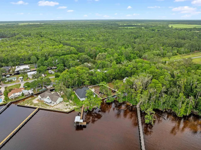 a view of a lake with a city