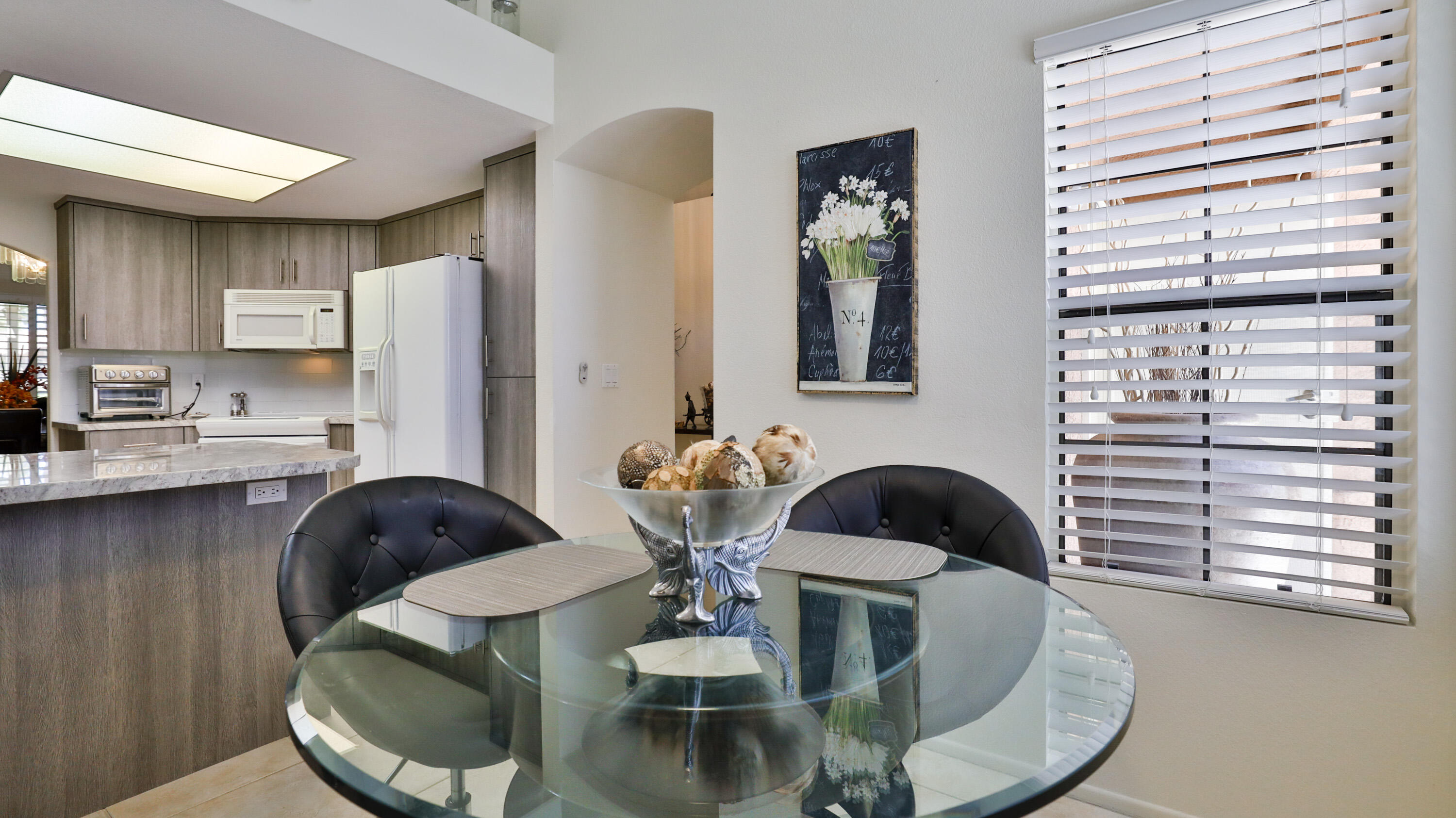 42641 Liolios Drive Palm Desert, CA 92211 - Photo 22 of 44 a living room with furniture and a wooden floor