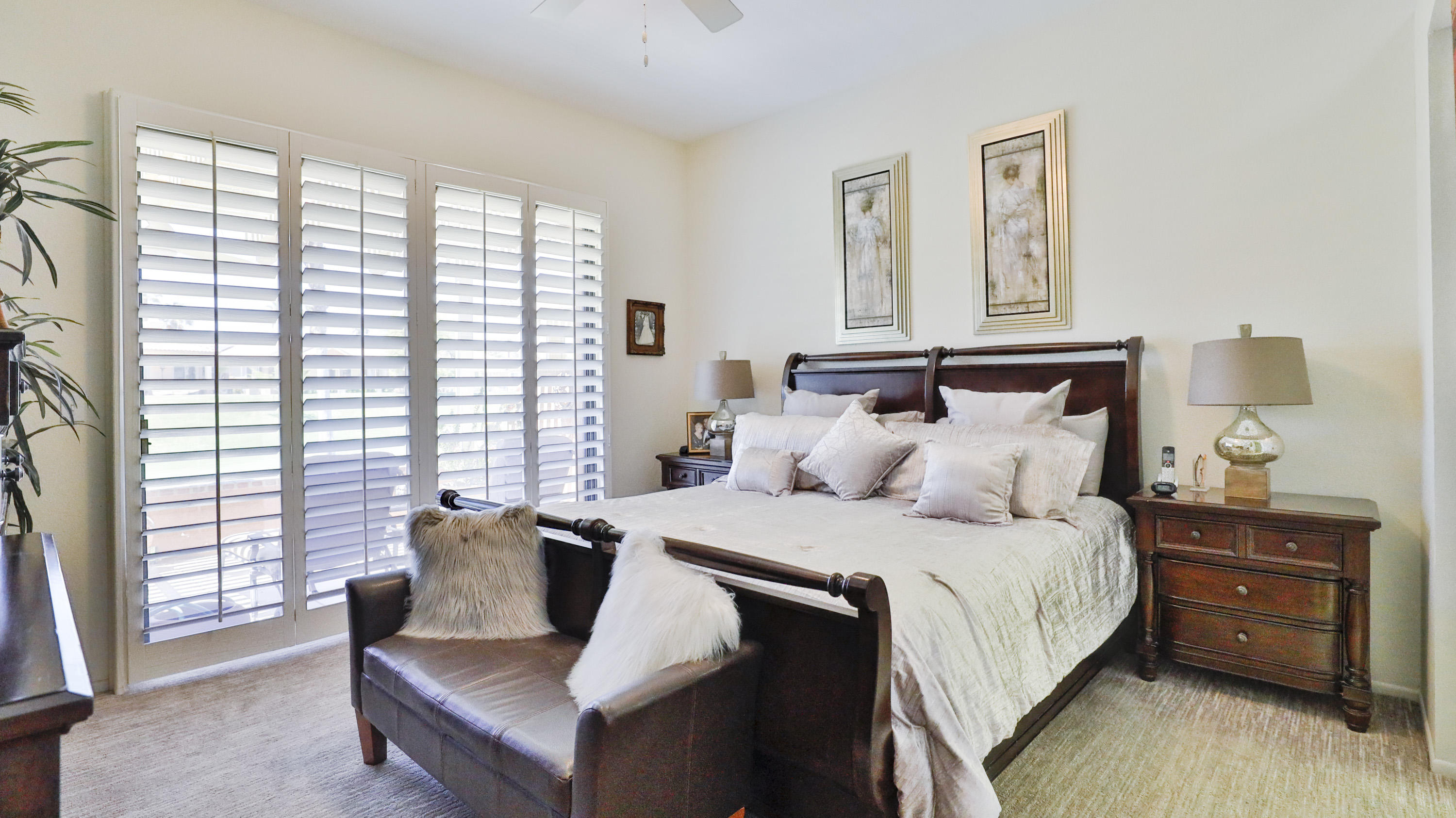 42641 Liolios Drive Palm Desert, CA 92211 - Photo 24 of 44 a bedroom with bed and window