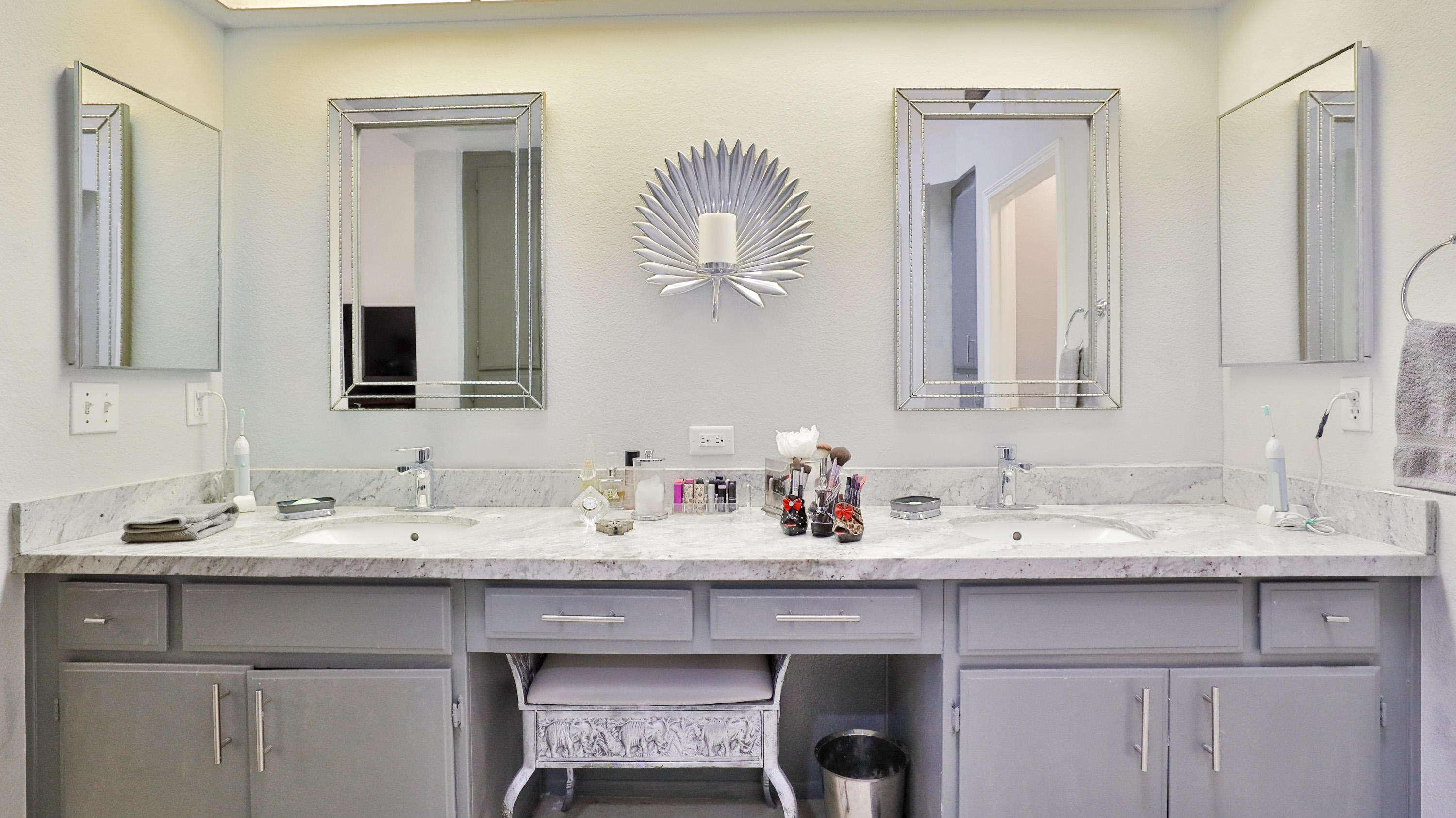 42641 Liolios Drive Palm Desert, CA 92211 - Photo 27 of 44 a bathroom with a sink and a mirror