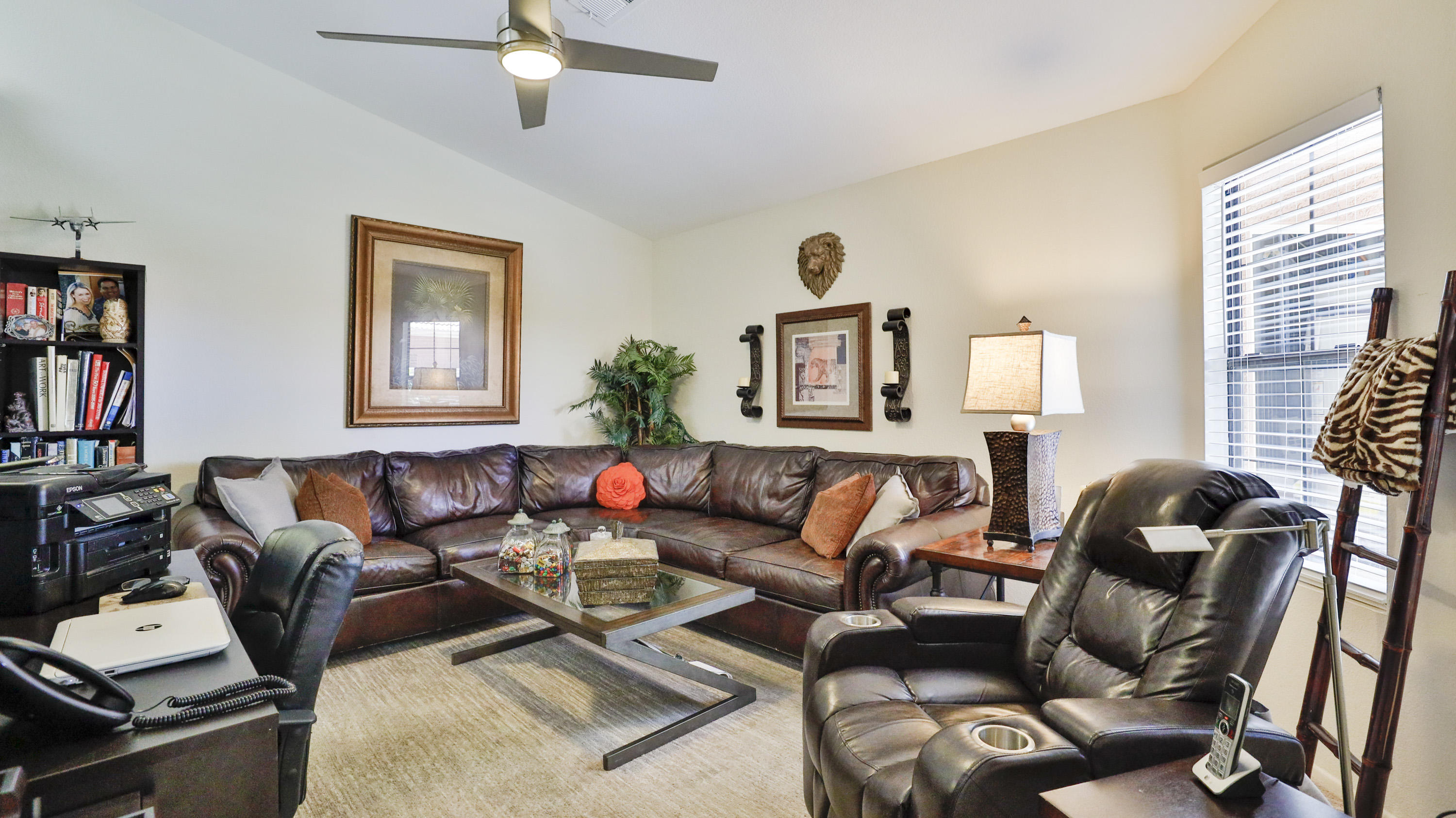 42641 Liolios Drive Palm Desert, CA 92211 - Photo 29 of 44 a living room with furniture and a window