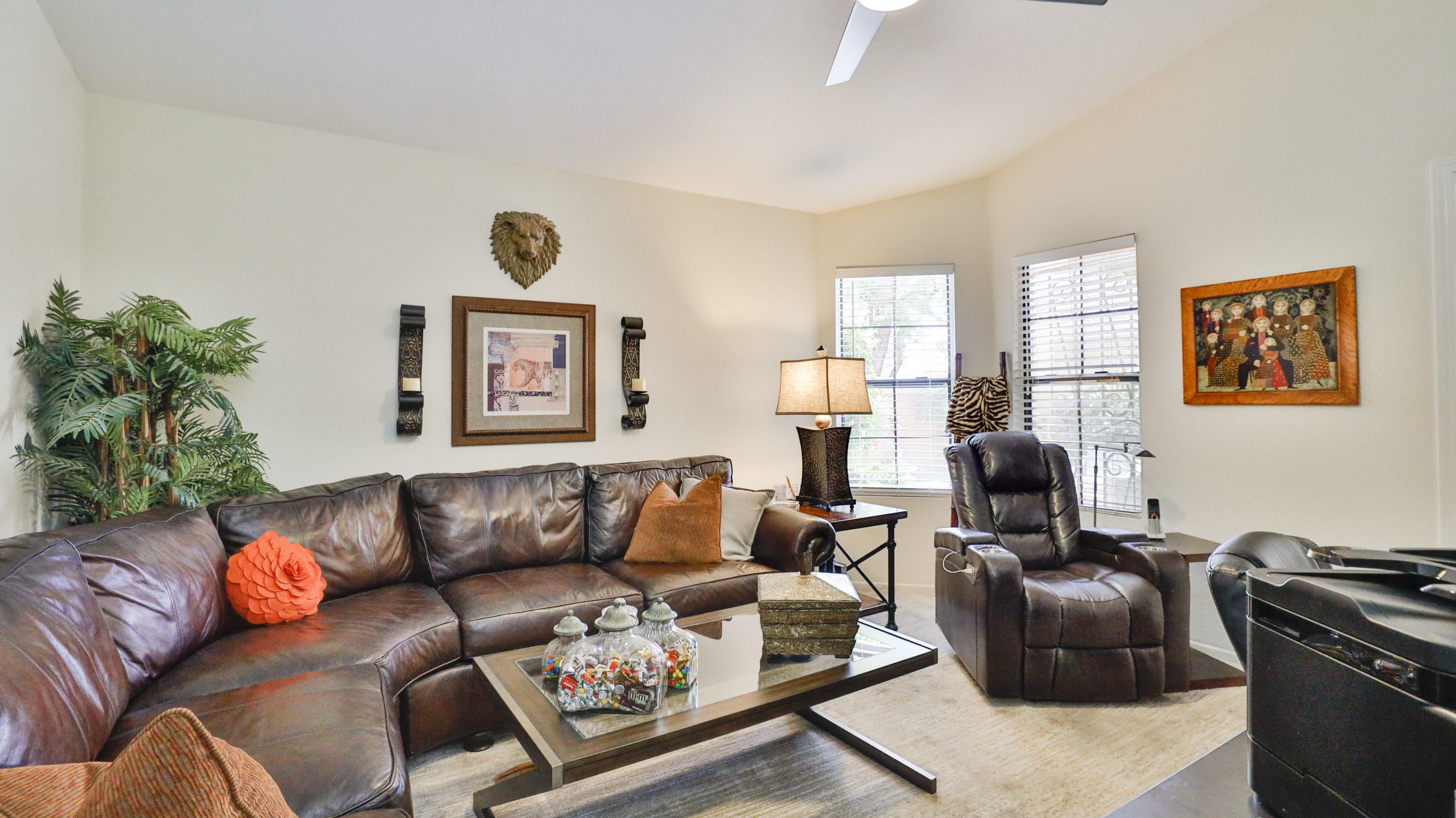 42641 Liolios Drive Palm Desert, CA 92211 - Photo 30 of 44 a living room with furniture and a large window