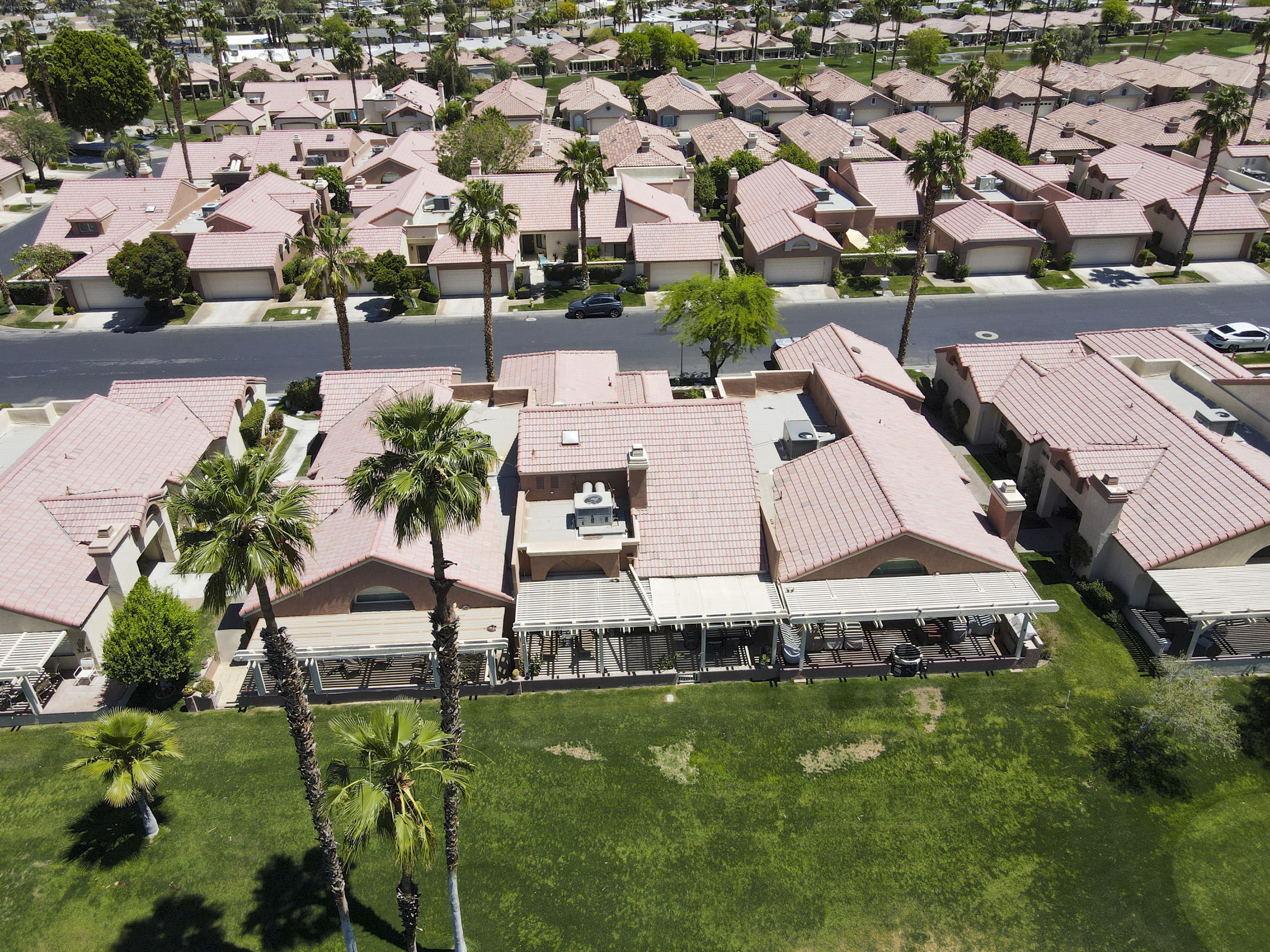 42641 Liolios Drive Palm Desert, CA 92211 - Photo 40 of 44 an aerial view of a house with a yard