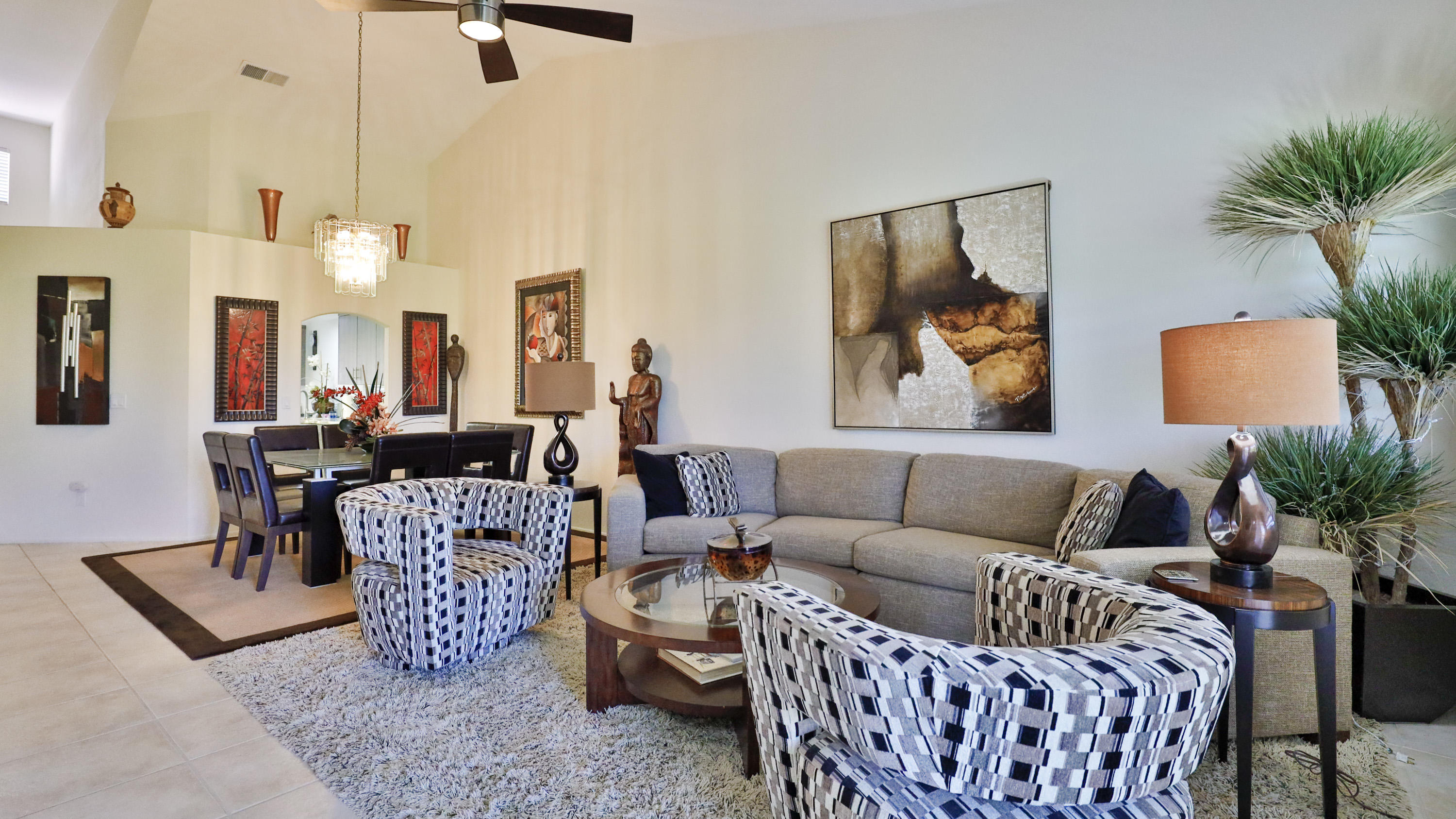 42641 Liolios Drive Palm Desert, CA 92211 - Photo 7 of 44 a living room with furniture and a potted plant
