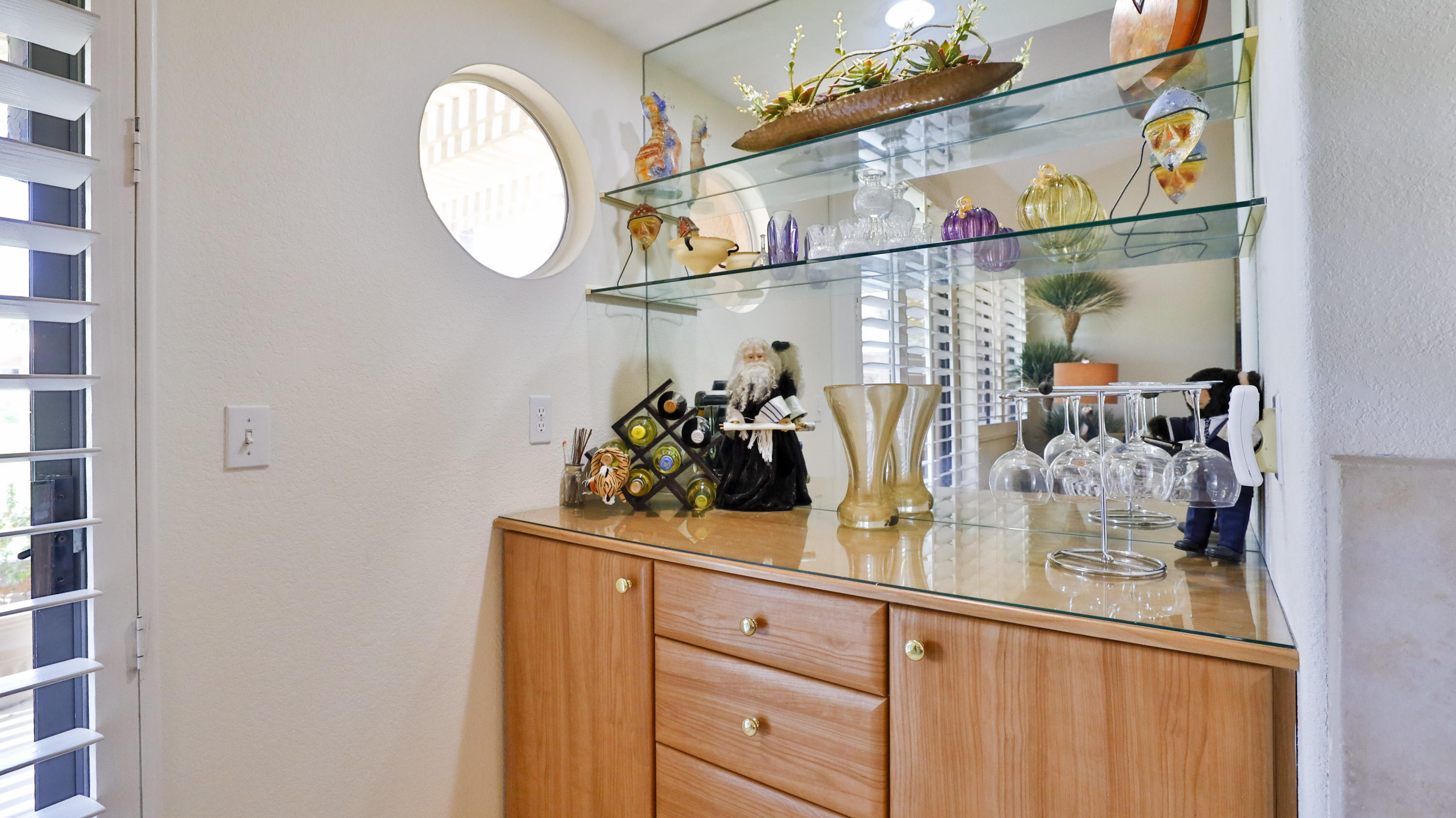 42641 Liolios Drive Palm Desert, CA 92211 - Photo 9 of 44 a view of mirror and cabinets