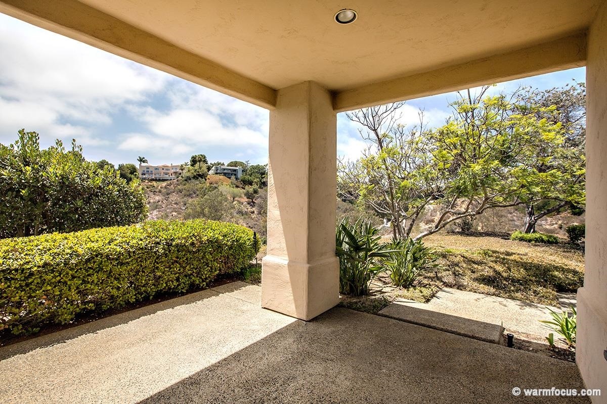 4610 Rancho Reposo Del Mar, CA 92014 - Photo 15 of 25 Downstairs bedroom deck has it's own unique view of the beautifully cared for surrounding landscape.